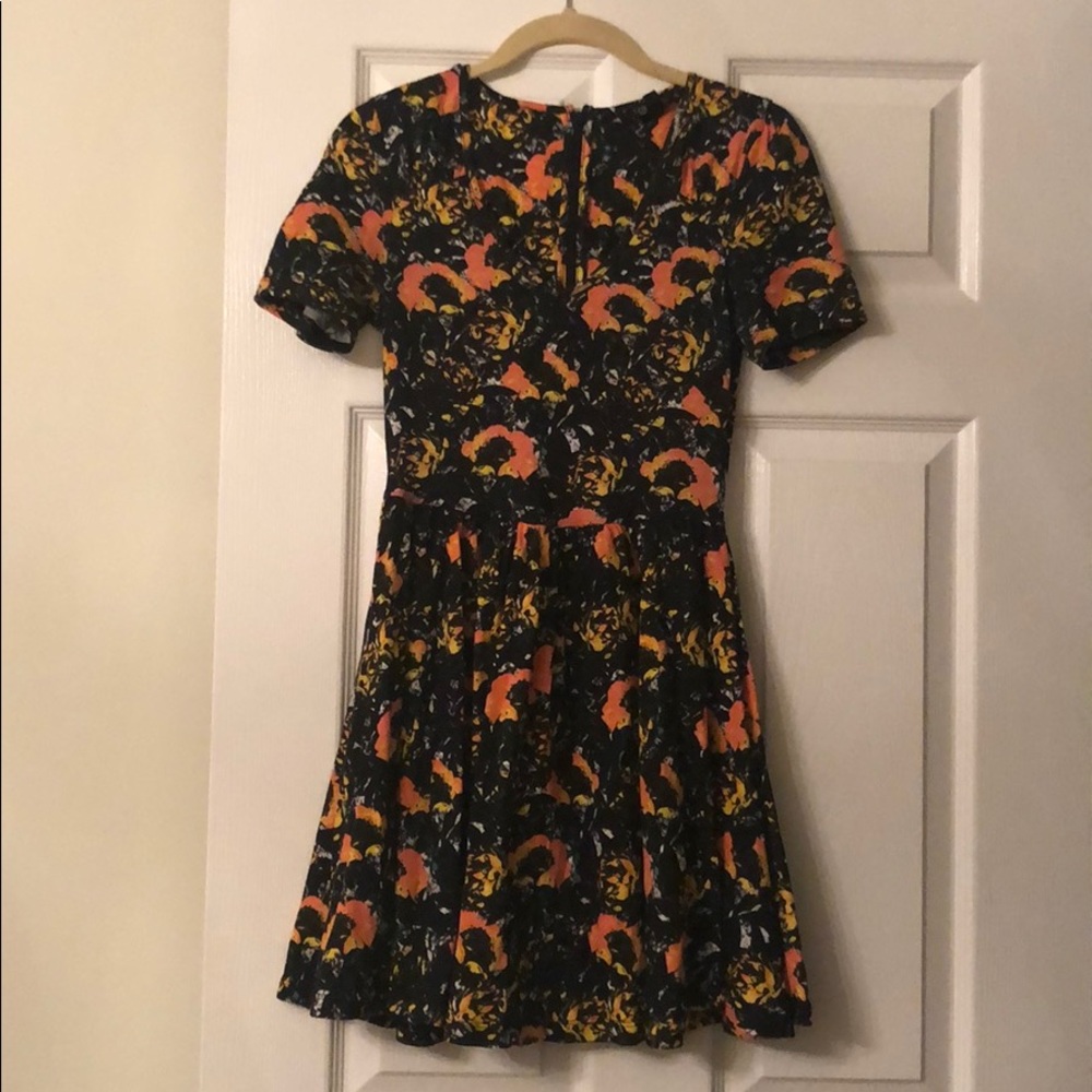 Black and orange mini dress